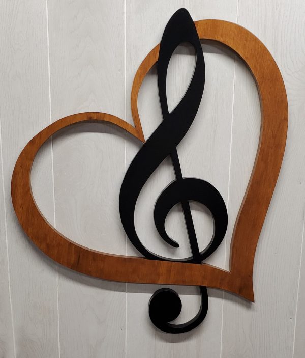 Music lover stained heart with black clef mark.